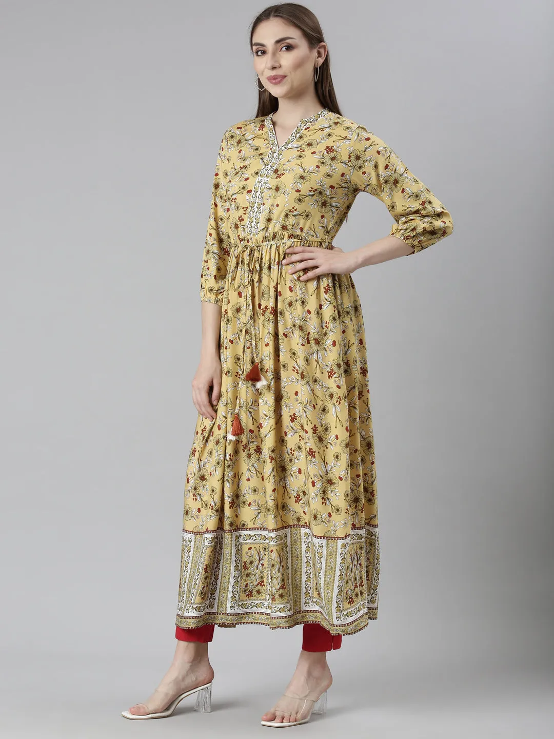 Neeru's Yellow Straight Casual Floral Dresses