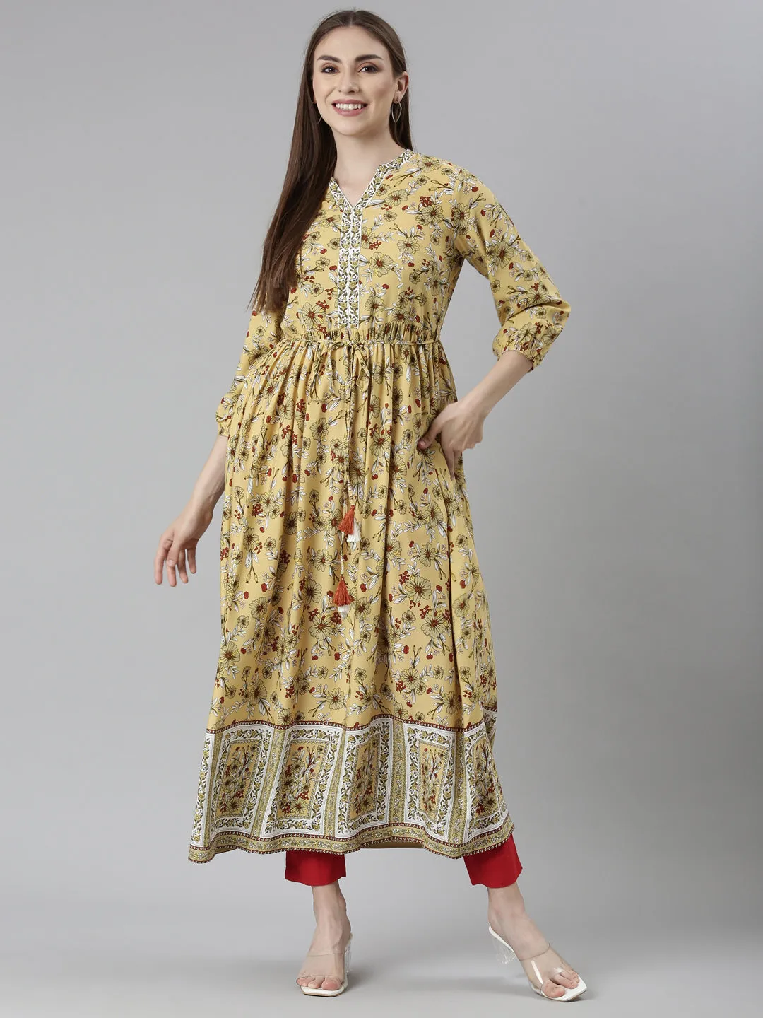 Neeru's Yellow Straight Casual Floral Dresses