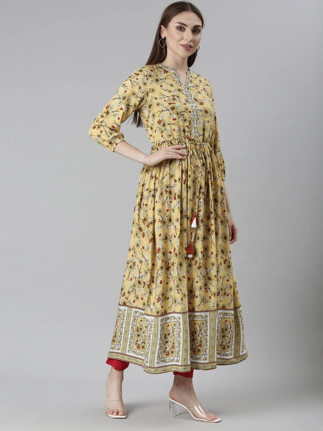 Neeru's Yellow Straight Casual Floral Dresses