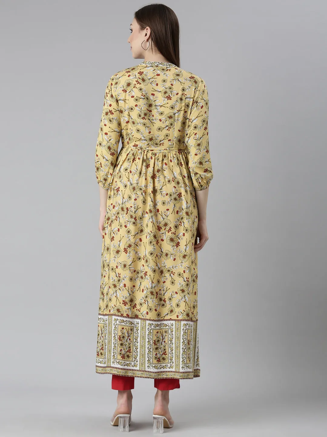 Neeru's Yellow Straight Casual Floral Dresses